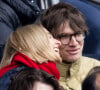 Pierre de Maere était accompagné d'une jolie blonde
 
Exclusif - Pierre de Maere et une amie dans les tribunes du match de football PSG / Reims au Parc des Princes à Paris le 10 mars 2024.