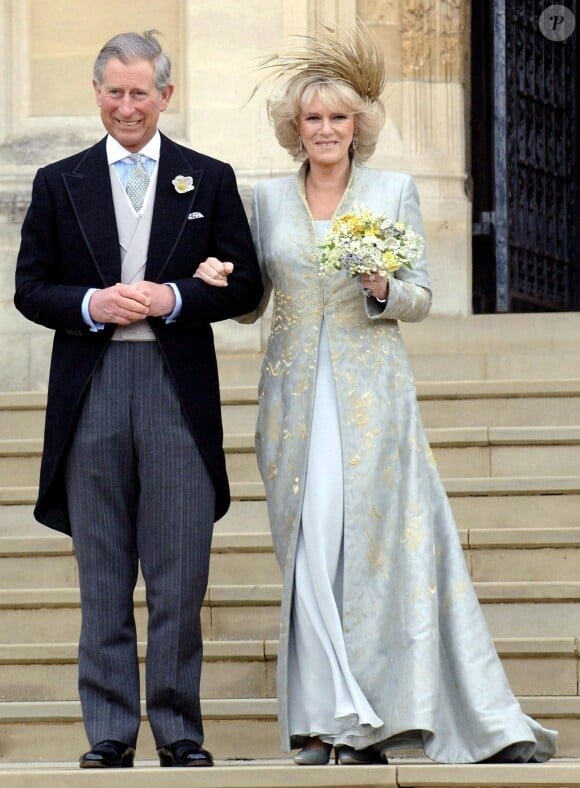 Vive les mariés ! Charles et Camilla quittent la chapelle St George à Windsor, après s'être dit oui le 9 avril 2005. Photo Stefan Rousseau/PA/ABACA.