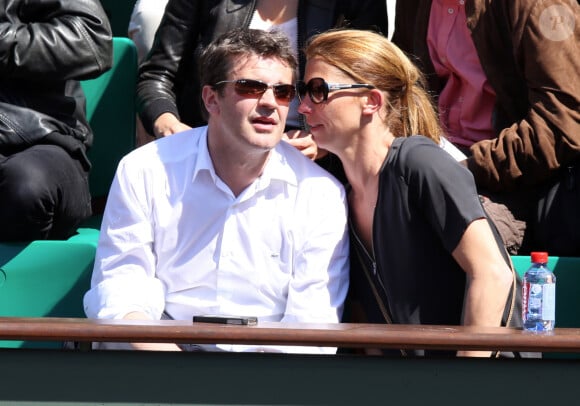 Herve Mathoux et sa femme Maryline Olivie - Jour 10 - People aux Internationaux de France de tennis de Roland Garros lors du match de Jo-Wilfrid Tsonga contre Roger Federer le 4 juin 2013. 