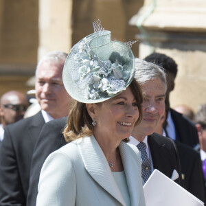 Les invités arrivent à la chapelle St. George pour le mariage du prince Harry et de Meghan Markle au château de Windsor, Royaume-Uni, le 19 mai 2018.