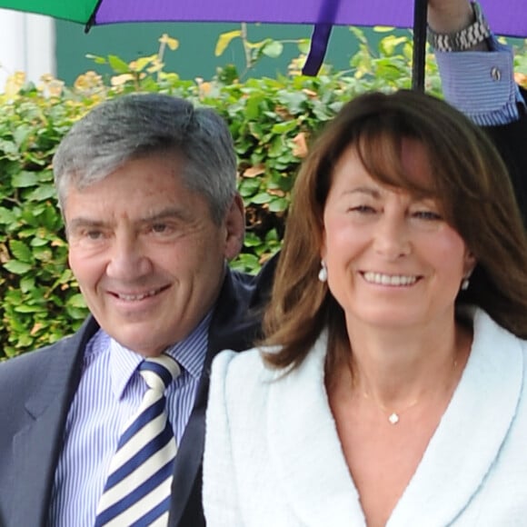Carole et Michael Middleton se rendent sur le tournoi de tennis de Wimbledon à Londres le 27 juin 2014. 