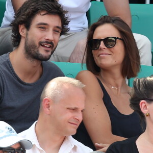 Laure Manaudou et Jérémy Frérot dans les tribunes lors de la finale des Internationaux de tennis de Roland-Garros à Paris, le 7 juin 2015.