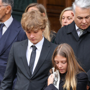 Roschdy Zem, Roman Lavoine et sa cousine Tess Rambaldi (fille de Marie Poniatowski et petite-fille du défunt) - Sorties des obsèques du prince Jean-Stanislas Poniatowski en l'Eglise polonaise à Paris, France, le 29 avril 2024. © Jacovides-Moreau/Bestimage