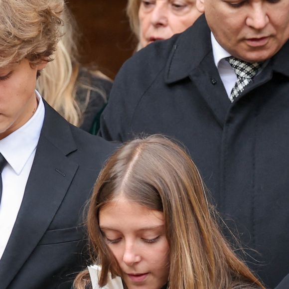 Roschdy Zem, Roman Lavoine et sa cousine Tess Rambaldi (fille de Marie Poniatowski et petite-fille du défunt) - Sorties des obsèques du prince Jean-Stanislas Poniatowski en l'Eglise polonaise à Paris, France, le 29 avril 2024. © Jacovides-Moreau/Bestimage