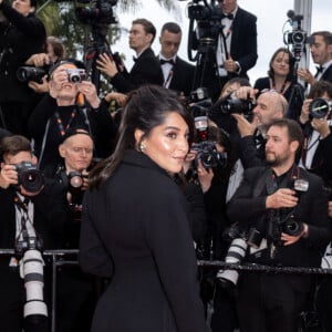 Un signe reconnu mondialement comme un symbole de solidarité avec les Palestiniens
 
Leïla Bekhti - Montée des marches du film " Furiosa : A Mad Max Saga " lors du 77ème Festival International du Film de Cannes, au Palais des Festivals à Cannes. Le 15 mai 2024 © Jacovides-Moreau / Bestimage