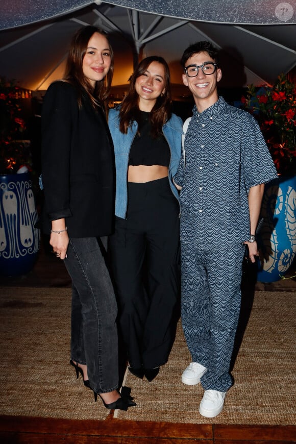 Exclusif - Charlotte Siné et sa soeur, Tristan Mattioli à la soirée de lancement de la collection capsule "Vilebrequin x Abu Dhabi limited édition" à la plage Vilebrequin (plage ondine) lors du 77ème Festival International du Film de Cannes le 14 mai 2024. © Christophe Clovis/Bestimage