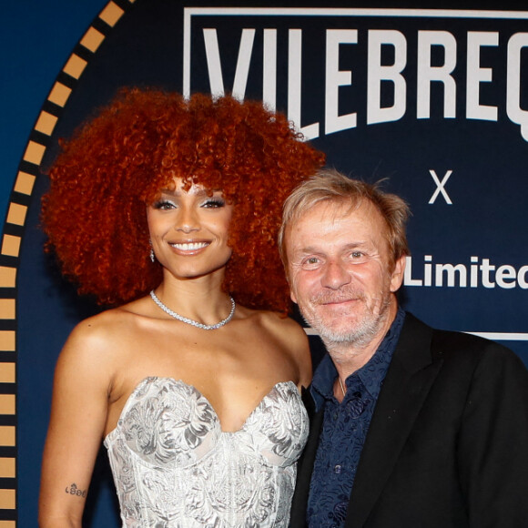 Exclusif - Alicia Aylies (miss France 2017), Roland Herlory (CEO de Vilebrequin) à la soirée de lancement de la collection capsule "Vilebrequin x Abu Dhabi limited édition" à la plage Vilebrequin (plage ondine) lors du 77ème Festival International du Film de Cannes le 14 mai 2024. © Christophe Clovis/Bestimage