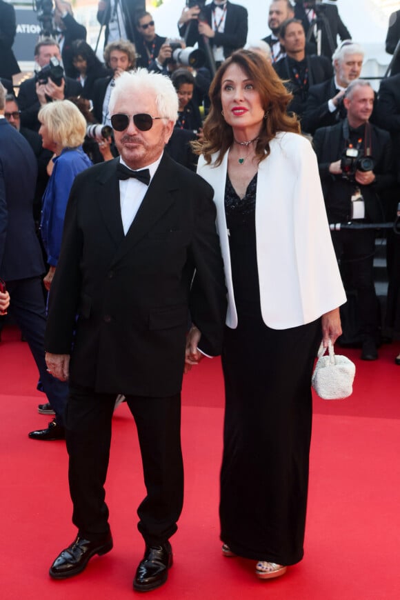 Marc Cerrone et sa femme Jill - Montée des marches pour la cérémonie de clôture du 77ème Festival International du Film de Cannes au Palais des Festivals à Cannes. Le 25 mai 2024 © Christophe Clovis / Bestimage 