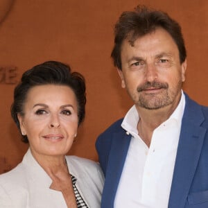 Henri Leconte et Maria Dowlatshahi au village lors des Internationaux de France de tennis de Roland Garros 2024, à Paris, le 26 mai 2024. © Jacovides-Moreau/Bestimage