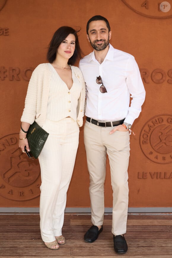 Jimmy Mohamed et sa femme Souailla au village lors des Internationaux de France de tennis de Roland Garros 2024, à Paris, le 26 mai 2024. © Jacovides-Moreau/Bestimage