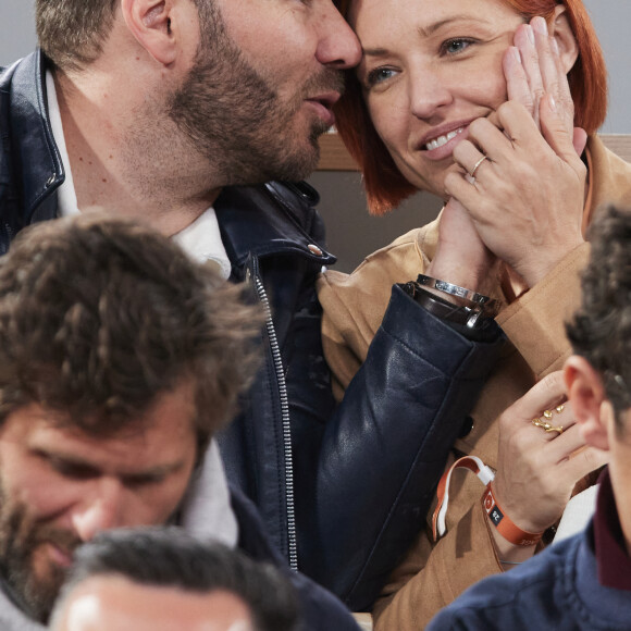 Natasha St-Pier et son compagnon Vincent Bidal dans les tribunes lors des Internationaux de France de tennis de Roland Garros 2024 à Paris, France, le 28 mai 2024. © Jacovides-Moreau/Bestimage 