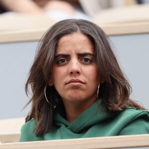 Et elle était attendue sur le tournage d'une nouvelle série de TF1 "Ado mais pas trop".
Inès Reg (Inès Reghioua) dans les tribunes des Internationaux de France de tennis de Roland Garros 2024 à Paris, France, le 3 juin 2024. © Jacovides-Moreau/Bestimage