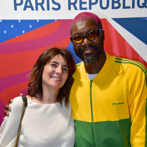 Estelle Denis et Djibril Cissé lors de l'inauguration d'un magasin Intersport Paris République à Paris le 5 juin 2024. © Veeren / Bestimage 