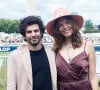 Vanille Clerc a fait une apparition en amoureux avec son compagnon Robinho Tavares
Vanille Clerc (fille de Julien Clerc et de Virginie Coupérie-Eiffel) et son compagnon au prix de Diane à l'hippodrome de Chantilly, France