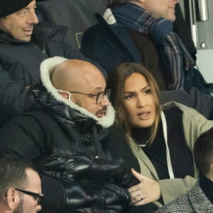 Vitaa (enceinte de son 3ème enfant) et son mari Hicham Bendaoud - People lors de la huitième de finale aller de la Ligue des champions entre le PSG et le Real Madrid au Parc des Princes à Paris le 15 février 2022. © Cyril Moreau/Bestimage