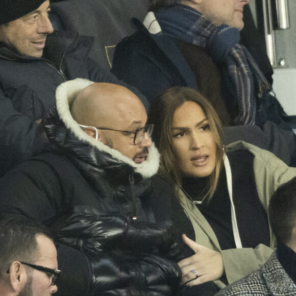 Vitaa (enceinte de son 3ème enfant) et son mari Hicham Bendaoud - People lors de la huitième de finale aller de la Ligue des champions entre le PSG et le Real Madrid au Parc des Princes à Paris le 15 février 2022. © Cyril Moreau/Bestimage