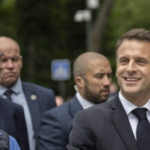 Emmanuel Macron, président de la République Française, et la Première dame Brigitte Macron, à la sortie du bureau de vote lors du deuxième tour des élections législatives au Touquet, ke 7 juillet 2024. © Eliot Blondet/Pool/Bestimage 