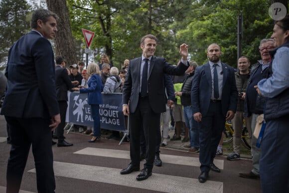 Emmanuel Macron, président de la République Française, et la Première dame Brigitte Macron, à la sortie du bureau de vote lors du deuxième tour des élections législatives au Touquet, ke 7 juillet 2024. © Eliot Blondet/Pool/Bestimage 