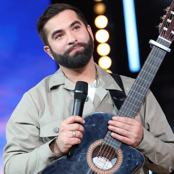 Et c'est tel un conquérant qu'il a débuté sa préparation intense à base de sport et de studio
Kendji Girac - Les personnalités se mobilisent lors de la 37ème édition du Téléthon sur le plateau de France 2, avec pour parrain Vianney. Cette année, 80,6 millions de dons ont été promis. Le 9 décembre 2023. © Coadic Guirec / Bestimage