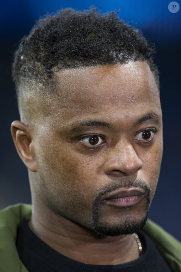 Patrice Evra - People dans les tribunes lors du match de ligue des champions entre le PSG et l'AC Milan au Parc des Princes à Paris le 25 octobre 2023. © Cyril Moreau/Bestimage