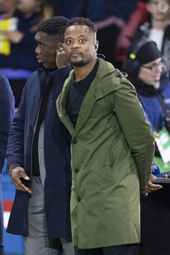 Patrice Evra - People dans les tribunes lors du match de ligue des champions entre le PSG et l'AC Milan au Parc des Princes à Paris le 25 octobre 2023. © Cyril Moreau/Bestimage