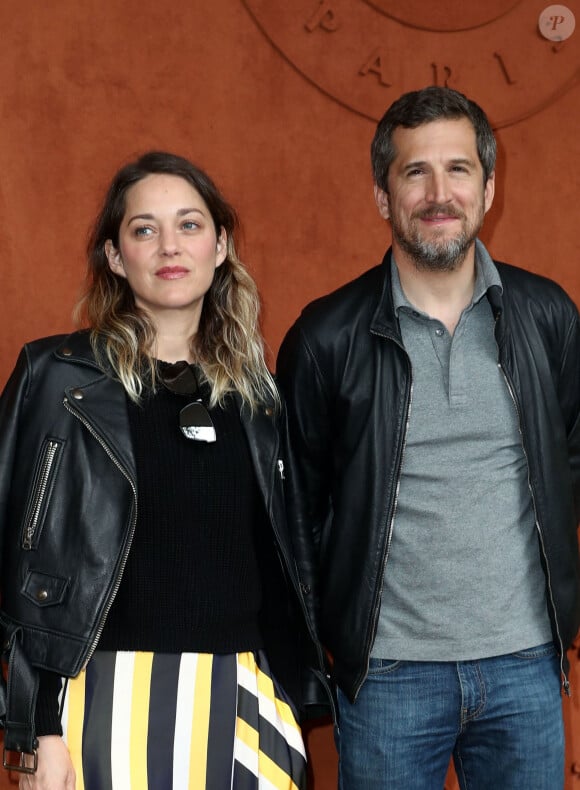 Guillaume Canet et sa compagne Marion Cotillard - People au village pour la finale hommes lors des internationaux de France de tennis de Roland Garros. © Jacovides - Moreau / Bestimage