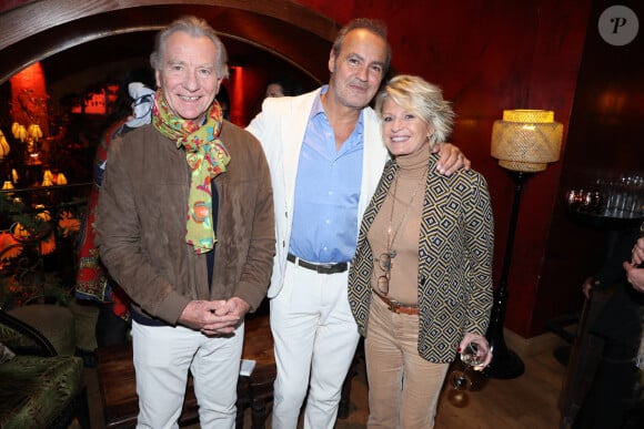 William Leymergie, Roland Perez et Sophie Davant assistent au lancement du livre de Roland Perez "Ma Mere, Dieu et Litzie" organisé par Five Eyes Production au Buddha Bar à Paris, le 8 novembre 2023. Jérôme Dominé/ABACAPRESS.COM