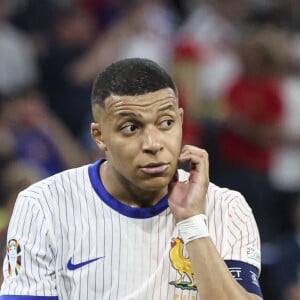 Il n'a finalement pas participé et depuis, il est resté muet, n'encourageant pas les Français

Kylian Mbappé - Déception des joueurs du France apres defaite - Demi-finale de l'Euro 2024 entre l'Espagne et la France (2-1) à Munich en Allemagne le 9 juillet 2024.