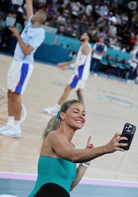 La consultante de Canal+ a pu se rendre à de très nombreux évènements durant la quinzaine
 
Laure Boulleau - Les célébrités assistent à la victoire de l'équipe de France de basket face au Canada (82-73) lors des Jeux Olympiques de Paris2024, le 6 août 2024. © Jacovides-Perusseau / Bestimage