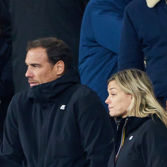 Laure Boulleau enceinte et Bruno Cheyrou - People des les tribunes de la coupe du Monde de Rugby France 2023 - Match de quart de finale "France-Afrique du Sud (28-29)" au Stade de France à Saint-Denis 15 octobre 2023. © Moreau-Jacovides/Bestimage