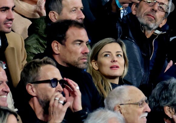 Laure Boulleau enceinte et Bruno Cheyrou, Philippe Caverivière - People des les tribunes de la coupe du Monde de Rugby France 2023 - Match de quart de finale "France-Afrique du Sud (28-29)" au Stade de France à Saint-Denis 15 octobre 2023. © Moreau-Jacovides/Bestimage