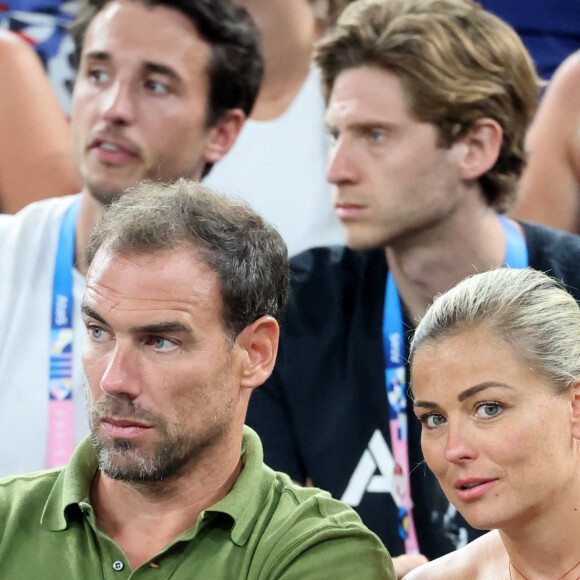 Bruno Cheyrou et Laure Boulleau - Les célébrités assistent à la victoire de l'équipe de France de basket face au Canada (82-73) lors des Jeux Olympiques de Paris2024, le 6 août 2024. © Jacovides-Perusseau / Bestimage 
