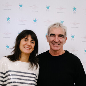 Estelle Denis et son compagnon Raymond Domenech - Le chef pâtissier Christophe Michalak organise un goûter caritatif au profit de l'association l'Etoile de Martin dans le salon Haute Couture de l'hôtel Plaza Athénée à Paris, le 21 novembre 2015. L'association l'Etoile de Martin soutient depuis neuf ans la recherche sur les cancers pédiatriques et apporte des moments de détente et de plaisir aux enfants hospitalisés.