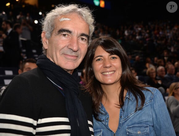 Raymond Domenech et sa compagne Estelle Denis - People lors de la finale du BNP Paribas masters entre Novak Djokovic et Andy Murray à l'Accor Hotels Arena à Paris le 8 novembre 2015. © Veeren / Bestimage