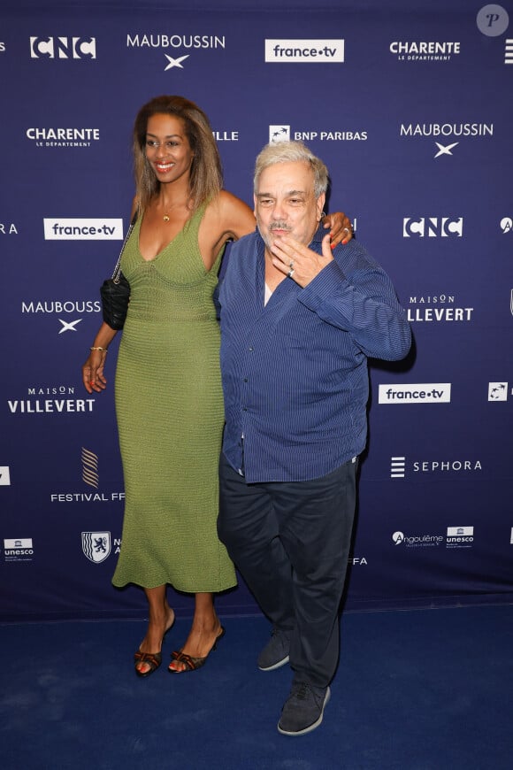 Marie-Sandra Badini Duran et son mari Didier Bourdon - Photocall de la cérémonie d'ouverture de la 17ème édition du Festival du Film Francophone (FFA) de Angoulême. Le 27 août 2024 © Coadic Guirec / Bestimage