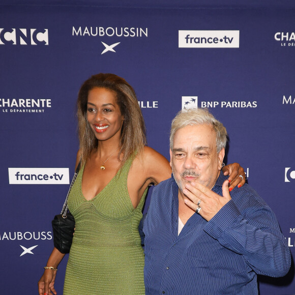 Marie-Sandra Badini Duran et son mari Didier Bourdon - Photocall de la cérémonie d'ouverture de la 17ème édition du Festival du Film Francophone (FFA) de Angoulême. Le 27 août 2024 © Coadic Guirec / Bestimage