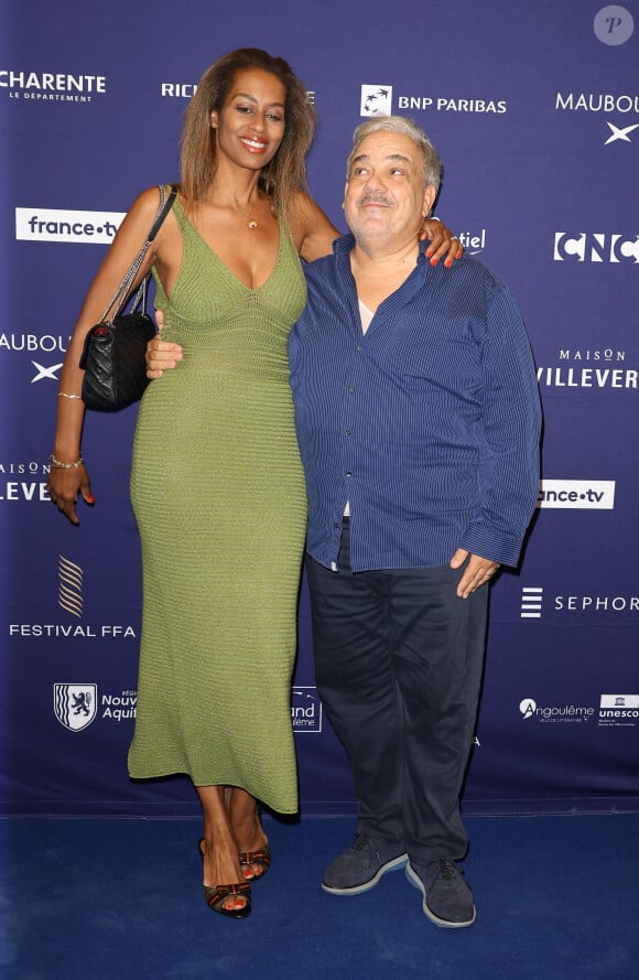 Marie-Sandra Badini Duran et son mari Didier Bourdon - Photocall de la cérémonie d'ouverture de la 17ème édition du Festival du Film Francophone (FFA) de Angoulême. Le 27 août 2024 © Coadic Guirec / Bestimage