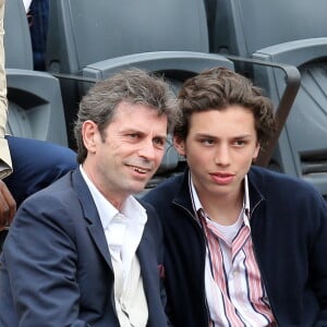 Fréderic Taddeï et son fils Diego - People dans les tribunes des Internationaux de France de tennis de Roland Garros à Paris. Le 31 mai 2015. 