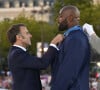 Emmanuel Macron, président de la République Française, Teddy Riner - La "Parade des Champions" des Jeux Olympiques et Paralympiques de Paris2024, sur les Champs-Elysées. Paris, le 14 septembre 2024. © Eric Tschaen/Pool/Bestimage 