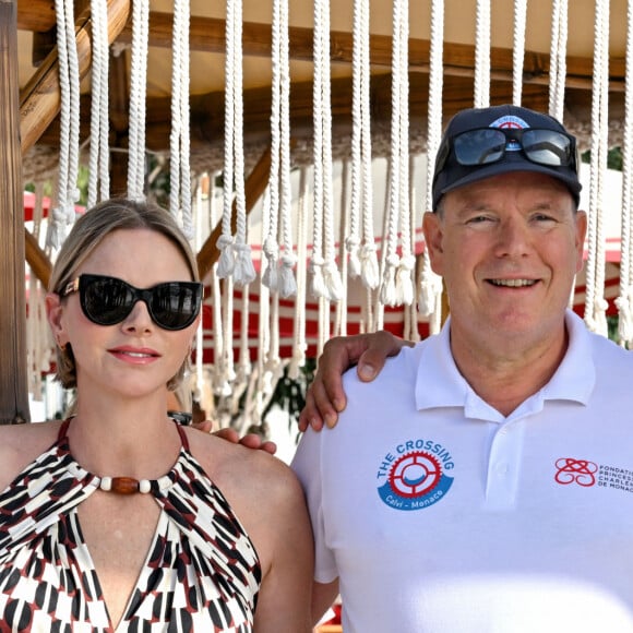 Le prince Albert II de Monaco et son épouse la princesse Charlene, accompagné de Sir Philip Green, principal sponsor de l'événement, ont assisté à l'arrivée de la seconde édition de la course en relais intitulée The Crossing : Calvi – Monaco Water Bike Challenge sur la plage du Larvotto à Monaco, le 7 septembre 2024. © Bruno Bebert/Bestimage