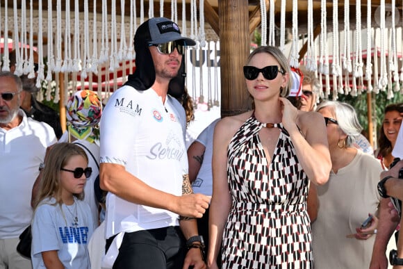 Le prince Albert II de Monaco et son épouse la princesse Charlene, accompagné de Sir Philip Green, principal sponsor de l'événement, ont assisté à l'arrivée de la seconde édition de la course en relais intitulée The Crossing : Calvi – Monaco Water Bike Challenge sur la plage du Larvotto à Monaco, le 7 septembre 2024. © Bruno Bebert/Bestimage