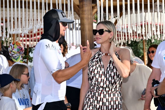 Le prince Albert II de Monaco et son épouse la princesse Charlene, accompagné de Sir Philip Green, principal sponsor de l'événement, ont assisté à l'arrivée de la seconde édition de la course en relais intitulée The Crossing : Calvi – Monaco Water Bike Challenge sur la plage du Larvotto à Monaco, le 7 septembre 2024. © Bruno Bebert/Bestimage