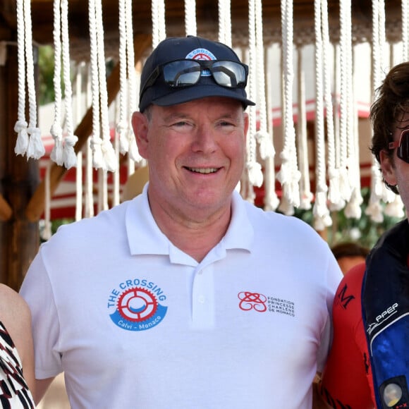 Le prince Albert II de Monaco et son épouse la princesse Charlene, accompagné de Sir Philip Green, principal sponsor de l'événement, ont assisté à l'arrivée de la seconde édition de la course en relais intitulée The Crossing : Calvi – Monaco Water Bike Challenge sur la plage du Larvotto à Monaco, le 7 septembre 2024. © Bruno Bebert/Bestimage