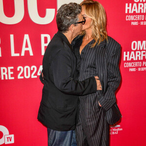 Le couple qui ne fait que parler de lui, a pu exister grace à Instagram. C'est via ce reseau social que Marc Lavoine a contacté Adrianna.
Marc Lavoine, Adriana Karembeu assistent à un photocall pour le Concerto For Peace d'Omar Harfouch au Théâtre des Champs-Elysées le 18 septembre 2024 à Paris, France. Photo par Shootpix/ABACAPRESS.COM