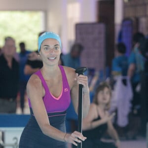 Tatiana Silva et Camille Lacourt participent au Défi de l’Eau au profit de l’Unicef à la Piscine de Vanves le 15 octobre 2022. © Giancarlo Gorassini / Bestimage