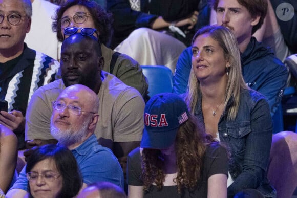 Ladji Doucouré et sa compagne - Célébrités assistent à la finale de l'épée individuelle homme avec le francais Yannick Borel qui perd en finale face à Kōki Kanō au Grand Palais lors des Jeux Olympiques de Paris 2024 (JO) à Paris le 28 juillet 2024. © Dominique Jacovides-Pierre Perusseau/Bestimage