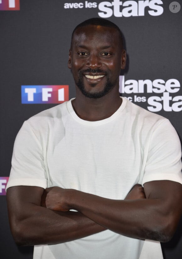 En interview pour "Purepeople.com", l'athlète a glissé quelques mots à son sujet.
Ladji Doucouré au photocall de la saison 10 de l'émission "Danse avec les stars" (DALS) au siège de TF1 à Boulogne-Billancourt, France, le 4 septembre 2019. © Veeren/Bestimage