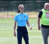 Mais ce qu'elle préfère, par-dessus tout, c'est la course à pied ! 
Catherine Kate Middleton, princesse de Galles, participe à des exercices de rugby lors d'une visite au Maidenhead Rugby Club, dans le Berkshire, le 7 juin 2023.