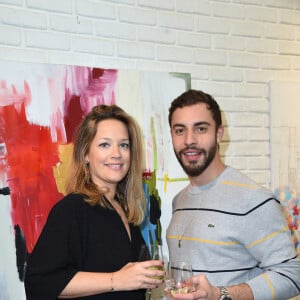 Caroline Faindt et Marwan Berreni au vernissage de l'exposition "Au Coeur Des Villes" de l'artiste C.Faindt au Louvre Factory à Paris le 4 février 2019