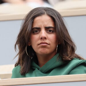 Inès Reg n'en a pas fini avec Natasha St-Pier.
Inès Reg (Inès Reghioua) dans les tribunes des Internationaux de France de tennis de Roland Garros à Paris, France. © Jacovides-Moreau/Bestimage